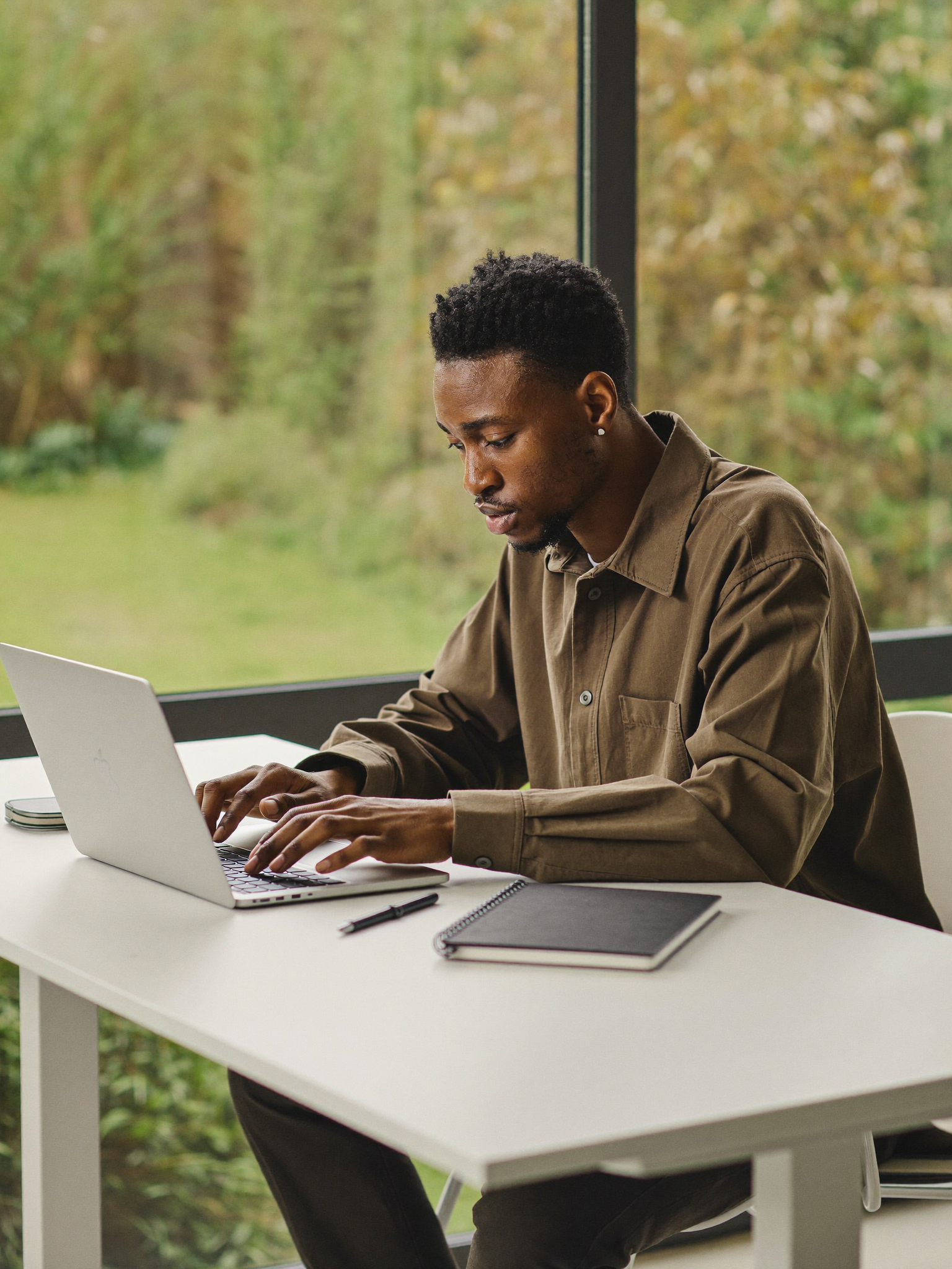Focus & Clarity — a person concentrating calmly at a bright desk