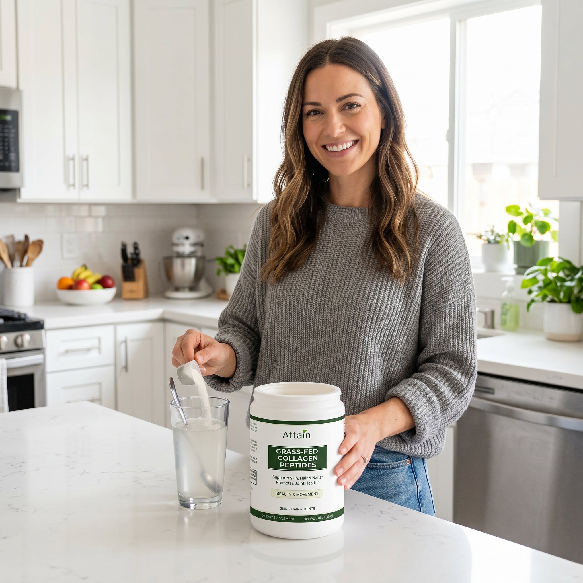 Woman scooping Attain Grass-Fed Collagen Peptides into a drink in a kitchen | Attain Supplements