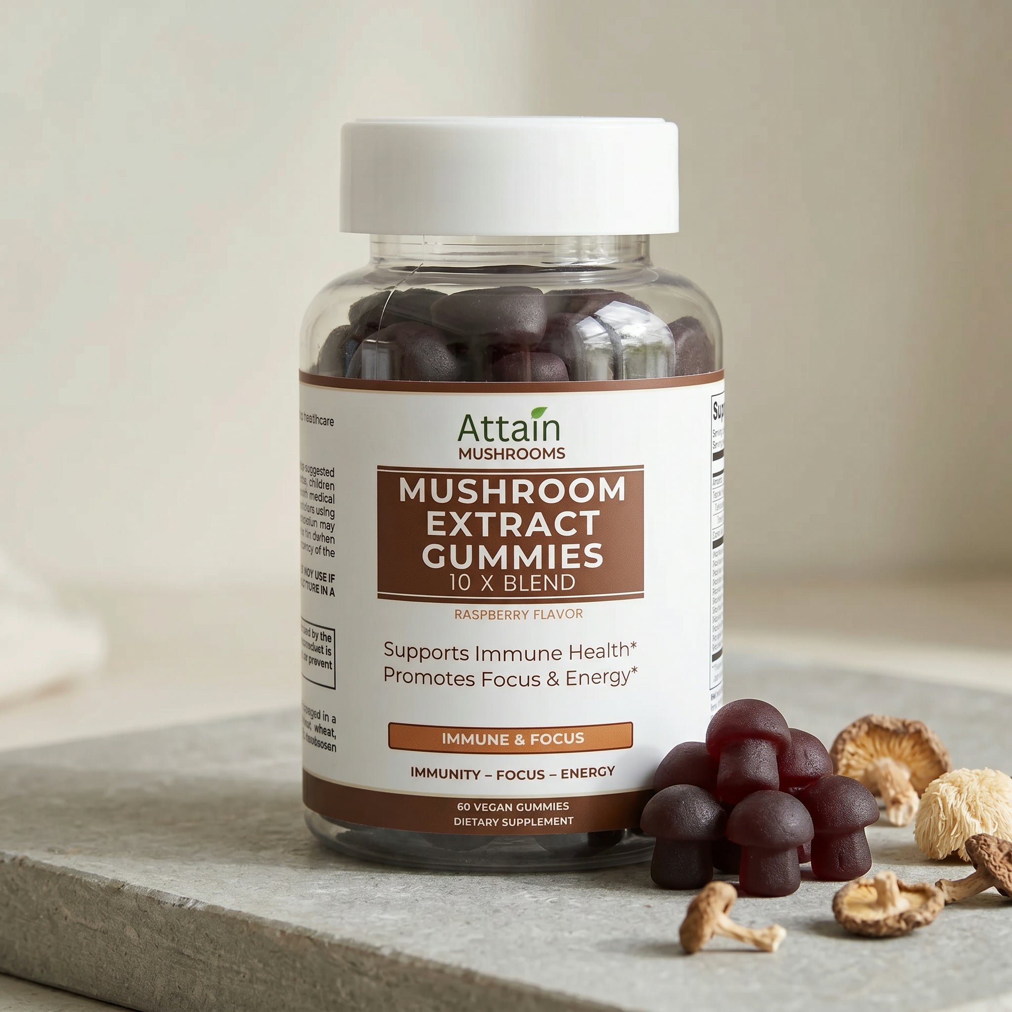 Attain Mushroom Extract Gummies with mushroom-shaped gummies and dried mushrooms | Attain Supplements